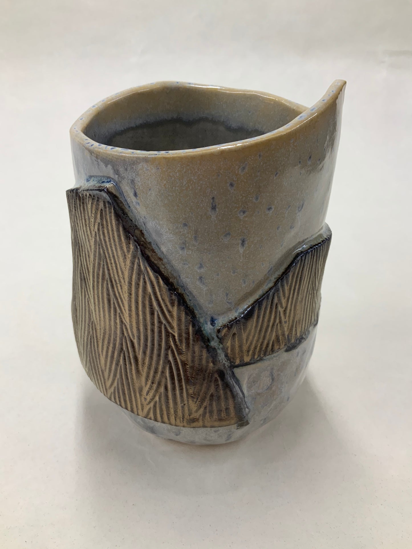 grey cream and gold bucket vessel